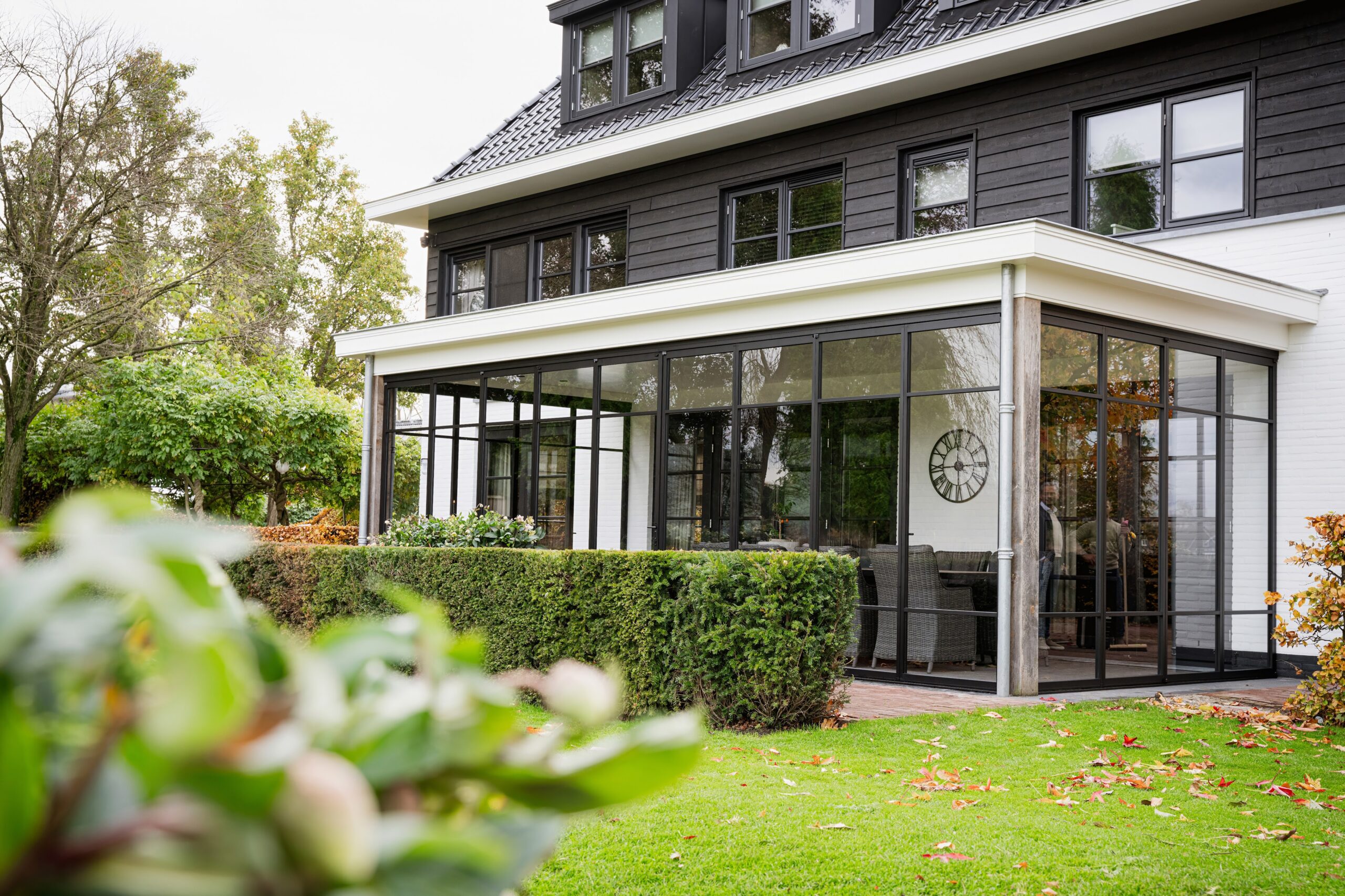 Vouwwanden met roedeverdeling voor veranda in Alblasserdam